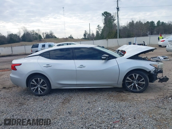 2016 Nissan Maxima SV with VIN 1N4AA6AP7GC439288, listed as a IAAI auction lot 41572262 with 223,185 mi miles and . Bid and sale history available at DreamBid. Image 13.