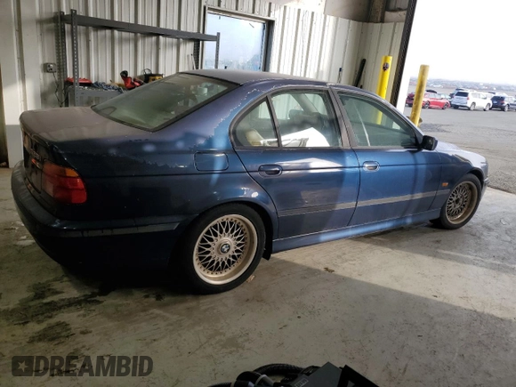 2000 BMW 5 Series 528iA with VIN WBADM6346YGU08106, listed as a Copart auction lot 84322434 with 298,587 mi miles and Clean Title. Bid and sale history available at carsss.com. Image 3.
