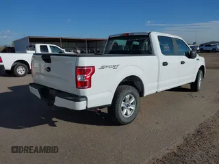 2018 Ford F-150 XL with VIN 1FTFW1E5XJFE79125, listed as a IAAI auction lot 42043296 with 165,003 mi miles. Bid and sale history available at carsss.com. Image 4.