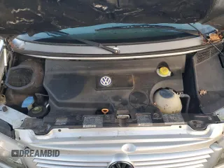2003 Volkswagen EuroVan MV с VIN WV2MB47053H002505, выставлен на аукционе Copart как лот 83840884 с пробегом 250 786 миль миль и Чистый • Clean title. История ставок и продаж доступна на DreamBid. Изображение 12.