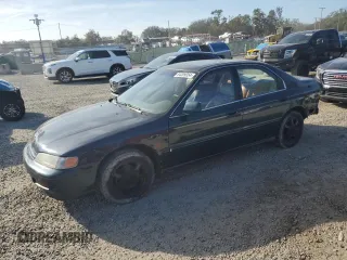 1994 Honda Accord EX w/Leather with VIN 1HGCD566XRA118799, listed as a Copart auction lot 84399354 with 124,229 mi miles and Salvage Title. Bid and sale history available at carsss.com. Image 1.