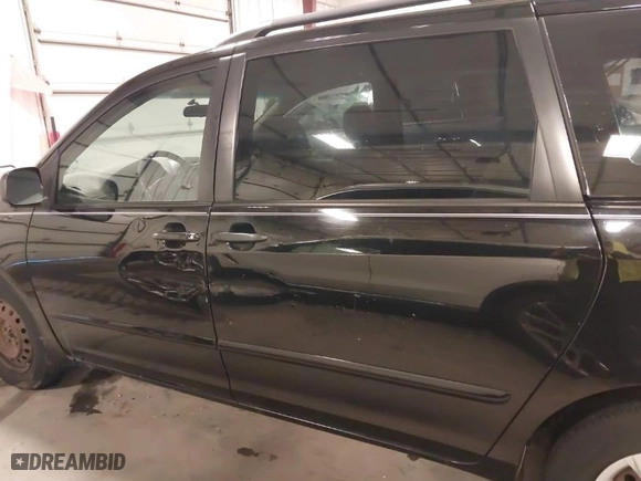 2008 Toyota Sienna CE with VIN 5TDZK23C28S214239, listed as a IAAI auction lot 41592957 with 214,229 mi miles. Bid and sale history available at carsss.com. Image 15.
