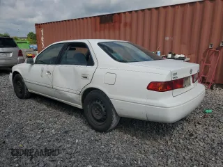 2000 Toyota Camry CE z VIN 4T1BG22K5YU936033, wystawiony jako Copart lot #57636215 z przebiegiem 242 889 mil mil oraz Szkoda całkowita • Salvage title. Historia ofert i sprzedaży dostępna na DreamBid. Obrazek 2.