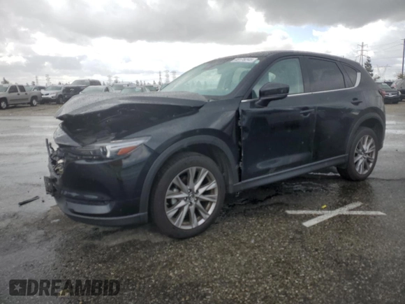 2020 Mazda CX-5 Grand Touring with VIN JM3KFADM3L0815055, listed as a Copart auction lot 48175245 with 56,602 mi miles and Salvage Title. Bid and sale history available at carsss.com. Image 1.