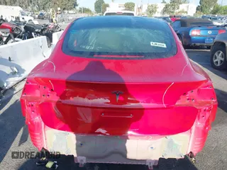 2023 Tesla Model 3 with VIN 5YJ3E1EA9PF695547, listed as a IAAI auction lot 40100334 with Not Provided miles and . Bid and sale history available at DreamBid. Image 17.