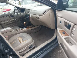 2003 Ford Taurus SEL Deluxe with VIN 1FAHP56S83A243290, listed as a IAAI auction lot 41743609 with 206,399 mi miles. Bid and sale history available at carsss.com. Image 5.