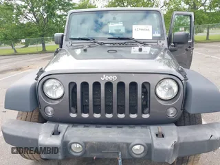 2016 Jeep Wrangler Willys Wheeler with VIN 1C4GJWAG2GL318981, listed as a IAAI auction lot 42390588 with 131,559 mi miles and . Bid and sale history available at DreamBid. Image 6.