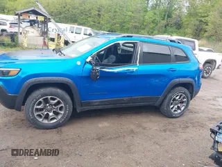 2021 Jeep Cherokee Trailhawk with VIN 1C4PJMBXXMD173102, listed as a IAAI auction lot 42205402 with 57,321 mi miles and . Bid and sale history available at DreamBid. Image 15.