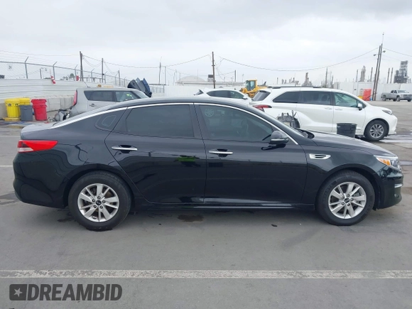 2016 Kia Optima LX with VIN 5XXGT4L37GG024243, listed as a IAAI auction lot 42098585 with 108,777 mi miles. Bid and sale history available at carsss.com. Image 14.