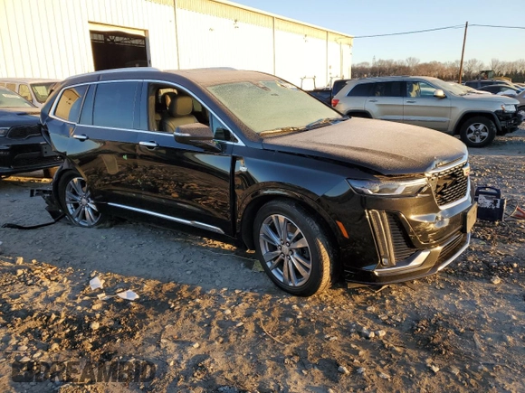 2023 Cadillac XT6 FWD Premium Luxury z VIN 1GYKPCRS7PZ105628, wystawiony jako Copart lot #84841124 z przebiegiem Nie podano mil oraz Szkoda całkowita • Salvage title. Historia ofert i sprzedaży dostępna na DreamBid. Obrazek 4.