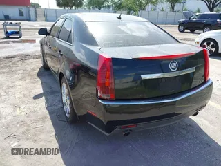 2008 Cadillac CTS RWD w/1SA with VIN 1G6DJ577180141687, listed as a IAAI auction lot 41999393 with 323,361 mi miles. Bid and sale history available at carsss.com. Image 3.