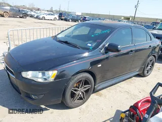 2013 Mitsubishi Lancer ES with VIN JA32U2FU2DU021402, listed as a IAAI auction lot 41703805 with Not provided miles and . Bid and sale history available at DreamBid. Image 2.