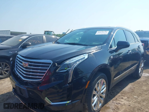2017 Cadillac XT5 Platinum AWD with VIN 1GYKNFRS6HZ130626, listed as a IAAI auction lot 42470536 with 128,129 mi miles and . Bid and sale history available at DreamBid. Image 17.