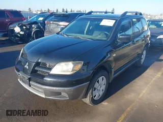 2004 Mitsubishi Outlander LS with VIN JA4LX31FX4U003476, listed as a IAAI auction lot 41290028 with 206,940 mi miles. Bid and sale history available at carsss.com. Image 2.