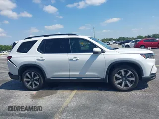 2024 Honda Pilot Touring z VIN 5FNYG2H72RB016937, wystawiony jako IAAI lot #42137854 z przebiegiem 18 028 mil mil oraz . Historia ofert i sprzedaży dostępna na DreamBid. Obrazek 13.