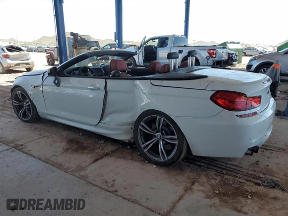 2013 BMW M6 с VIN WBSLZ9C59DDZ77823, выставлен на аукционе Copart как лот 62354225 с пробегом 74 704 миль миль и Списание • Salvage title. История ставок и продаж доступна на DreamBid. Изображение 2.