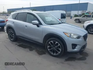 2016 Mazda CX-5 Grand Touring with VIN JM3KE2DY9G0723921, listed as a IAAI auction lot 41681522 with 83,893 mi miles. Bid and sale history available at carsss.com. Image 1.