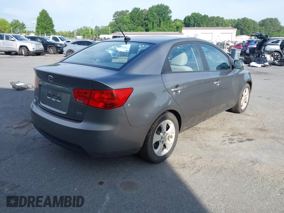 2010 Kia Forte EX z VIN KNAFU4A2XA5242981, wystawiony jako IAAI lot #42213767 z przebiegiem 174 155 mil mil oraz . Historia ofert i sprzedaży dostępna na DreamBid. Obrazek 4.
