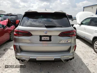 2023 BMW X5 M z VIN 5YMJU0C02P9P67480, wystawiony jako Copart lot #47676403 z przebiegiem 2 242 mil mil oraz . Historia ofert i sprzedaży dostępna na DreamBid. Obrazek 6.