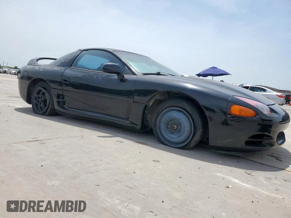 1999 Mitsubishi 3000GT z VIN JA3AM44H6XY002443, wystawiony jako Copart lot #57155505 z przebiegiem 201 588 mil mil oraz Czysty tytuł • Clean title. Historia ofert i sprzedaży dostępna na DreamBid. Obrazek 4.