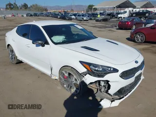 2020 Kia Stinger GT with VIN KNAE35LC7L6085529, listed as a IAAI auction lot 40671705 with 62,970 mi miles. Bid and sale history available at carsss.com. Image 1.