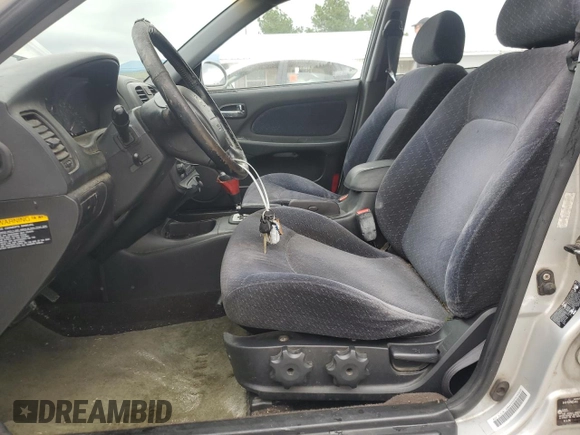2003 Hyundai Sonata with VIN KMHWF25H53A753679, listed as a Copart auction lot 84063614 with 179,175 mi miles and Salvage Title. Bid and sale history available at carsss.com. Image 7.