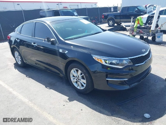 2018 Kia Optima S with VIN 5XXGT4L36JG221671, listed as a IAAI auction lot 41704040 with 136,815 mi miles. Bid and sale history available at carsss.com. Image 1.
