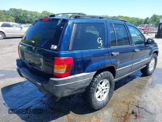 2004 Jeep Grand Cherokee Laredo z VIN 1J4GW48S44C204714, wystawiony jako IAAI lot #42137857 z przebiegiem 251 591 mil mil oraz . Historia ofert i sprzedaży dostępna na DreamBid. Obrazek 4.