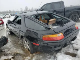 1989 Porsche 928 z VIN WP0JB0923KS861070, wystawiony jako Copart lot #88502805 z przebiegiem Nie podano mil oraz Szkody całkowita. Historia ofert i sprzedaży dostępna na DreamBid. Obrazek 2.