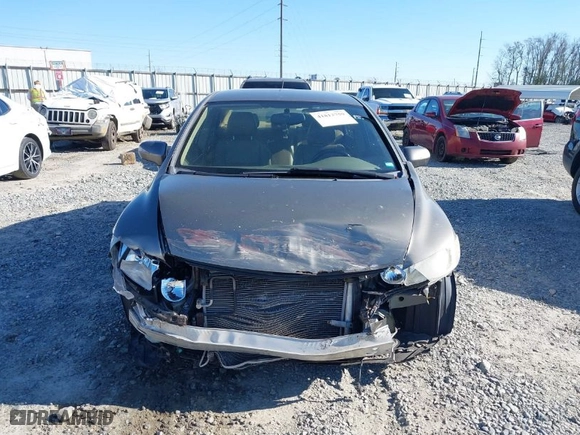 2006 Honda Civic Hybrid with VIN JHMFA36286S023717, listed as a IAAI auction lot 41813759 with 185,839 mi miles. Bid and sale history available at carsss.com. Image 13.