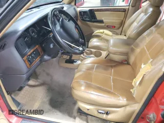 1996 Jeep Grand Cherokee Limited with VIN 1J4GZ78Y3TC186413, listed as a Copart auction lot 82370854 with 261,630 mi miles and Salvage Title. Bid and sale history available at carsss.com. Image 7.