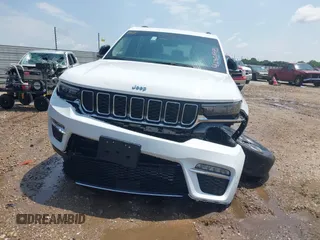 2023 Jeep Grand Cherokee with VIN 1C4RJYB63PC649000, listed as a IAAI auction lot 42306975 with 29,948 mi miles and . Bid and sale history available at DreamBid. Image 12.