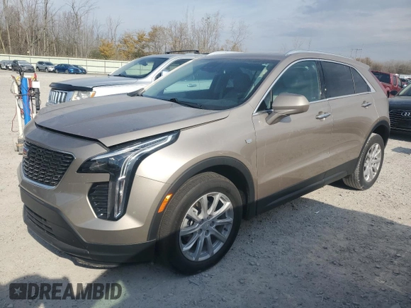 2022 Cadillac XT4 FWD Luxury with VIN 1GYAZAR4XNF121008, listed as a Copart auction lot 77599974 with 29,141 mi miles and Salvage title. Bid and sale history available at DreamBid. Image 1.