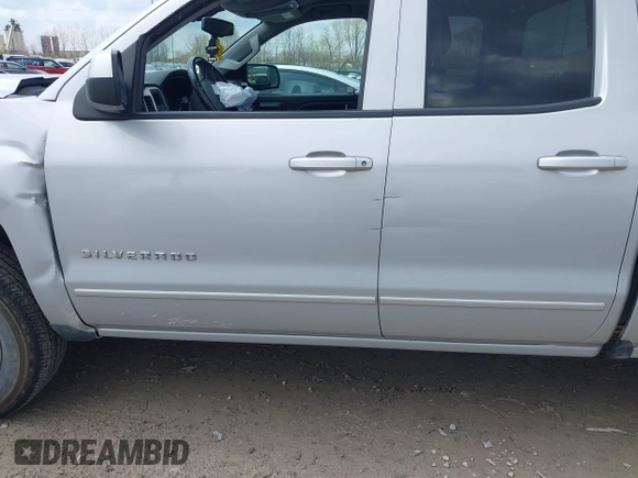 2018 Chevrolet Silverado 1500 LT with VIN 1GCVKREH9JZ119861, listed as a IAAI auction lot 42016088 with 91,176 mi miles and . Bid and sale history available at DreamBid. Image 14.