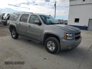 2012 Chevrolet Suburban LS with VIN 1GNWKLEG3CR308413, listed as a Copart auction lot 83671324 with 141,053 mi miles and Salvage title. Bid and sale history available at DreamBid. Image 4.