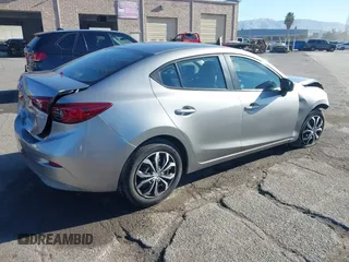 2015 Mazda 3 i SV with VIN JM1BM1T75F1258853, listed as a IAAI auction lot 41279651 with 36,437 mi miles. Bid and sale history available at carsss.com. Image 4.