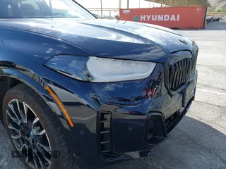 2024 BMW X5 xDrive50e with VIN 5UX43EU08R9S90964, listed as a IAAI auction lot 41690894 with 17,732 mi miles. Bid and sale history available at carsss.com. Image 6.