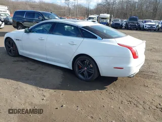 2015 Jaguar XJ with VIN SAJWA2EK9FMV87430, listed as a IAAI auction lot 41408797 with 101,147 mi miles and . Bid and sale history available at DreamBid. Image 3.