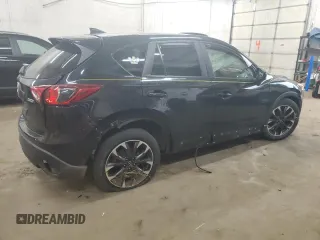 2016 Mazda CX-5 Grand Touring with VIN JM3KE4DY0G0854568, listed as a Copart auction lot 53259345 with 74,264 mi miles and Salvage Title. Bid and sale history available at carsss.com. Image 3.