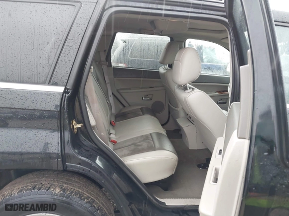 2006 Jeep Grand Cherokee Overland with VIN 1J8HR68296C308382, listed as a IAAI auction lot 41466673 with 167,028 mi miles. Bid and sale history available at carsss.com. Image 8.