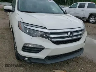 2018 Honda Pilot EX-L with VIN 5FNYF5H52JB023815, listed as a Copart auction lot 57692995 with 65,065 mi miles and Salvage title. Bid and sale history available at DreamBid. Image 14.