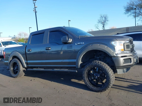 2019 Ford F-150 XL with VIN 1FTEW1C4XKKE39092, listed as a IAAI auction lot 41823989 with 49,430 mi miles and . Bid and sale history available at DreamBid. Image 14.