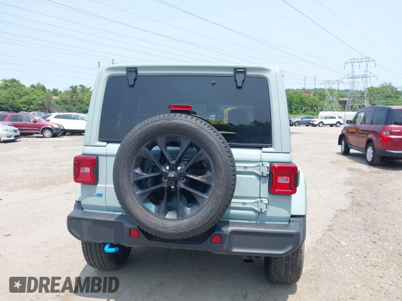 2023 Jeep Wrangler Sahara with VIN 1C4JJXP6XPW554741, listed as a IAAI auction lot 42380681 with 15,148 mi miles and . Bid and sale history available at DreamBid. Image 17.