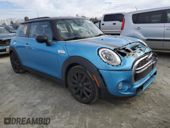 2018 MINI Hardtop Cooper S with VIN WMWXP7C5XJ2A48590, listed as a Copart auction lot 86309584 with 56,643 mi miles and Salvage Title. Bid and sale history available at DreamBid. Image 4.