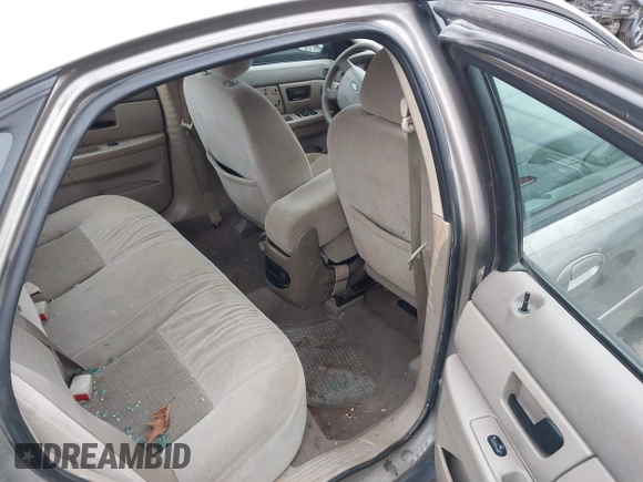 2005 Ford Taurus SE with VIN 1FAFP53215A127489, listed as a IAAI auction lot 40940239 with 127,180 mi miles. Bid and sale history available at carsss.com. Image 8.