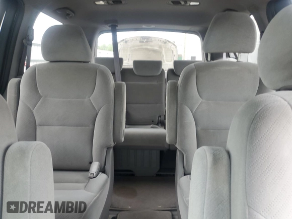 2010 Honda Odyssey LX z VIN 5FNRL3H29AB016853, wystawiony jako Copart lot #56602085 z przebiegiem 154 518 mil mil oraz Szkoda całkowita • Salvage title. Historia ofert i sprzedaży dostępna na DreamBid. Obrazek 10.