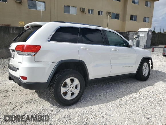 2016 Jeep Grand Cherokee Laredo z VIN 1C4RJEAG6GC390768, wystawiony jako Copart lot #51459885 z przebiegiem 130 690 mil mil oraz Szkoda całkowita • Salvage title. Historia ofert i sprzedaży dostępna na DreamBid. Obrazek 3.