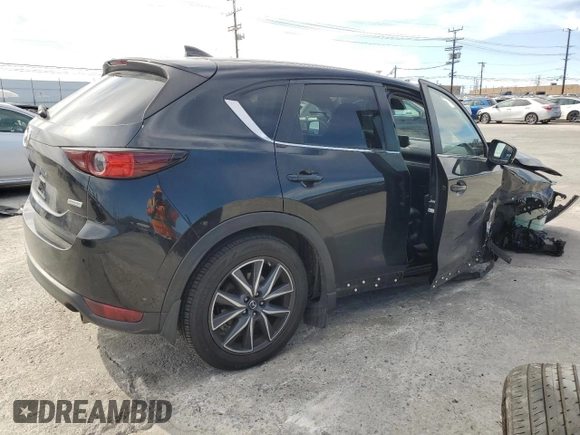 2018 Mazda CX-5 Touring z VIN JM3KFBCM4J0444167, wystawiony jako Copart lot #45900645 z przebiegiem 85 881 mil mil oraz Czysty tytuł • Clean title. Historia ofert i sprzedaży dostępna na DreamBid. Obrazek 3.