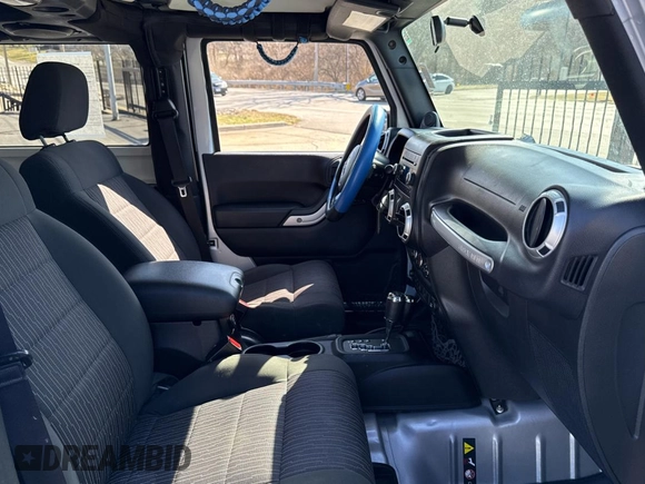 2012 Jeep Wrangler Arctic z VIN 1C4AJWBG2CL229572, wystawiony jako Copart lot #48719465 z przebiegiem 82 619 mil mil oraz Czysty tytuł • Clean title. Historia ofert i sprzedaży dostępna na DreamBid. Obrazek 5.
