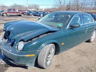 2005 Jaguar S-Type with VIN SAJWA01T95FN51551, listed as a IAAI auction lot 41637854 with 90,075 mi miles and . Bid and sale history available at DreamBid. Image 19.